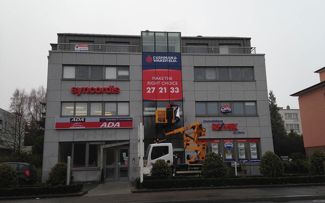 Signalétique Immobilière adhésive pour Cushman & Wakefield